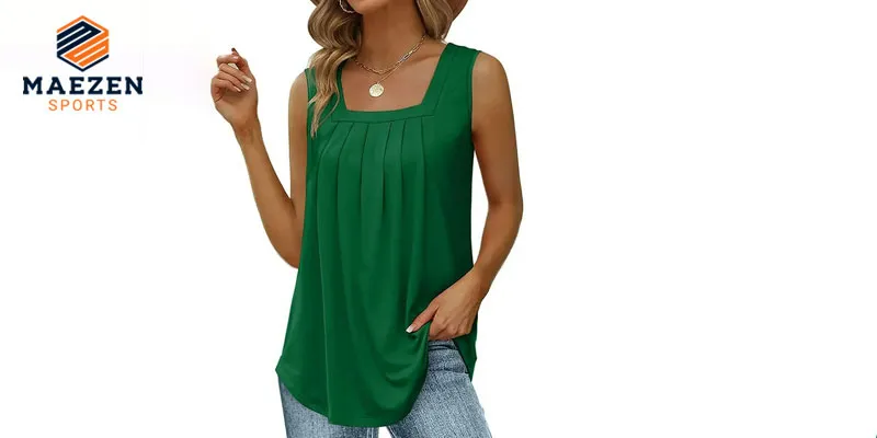 "Female model in a green pleated tank top from Maezen  Sports, paired with blue jeans, showcasing stylish and comfortable casual wear."