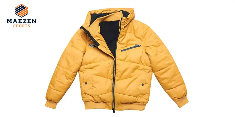 A yellow puffer jacket with a black interior, shown in a flat lay on a white background