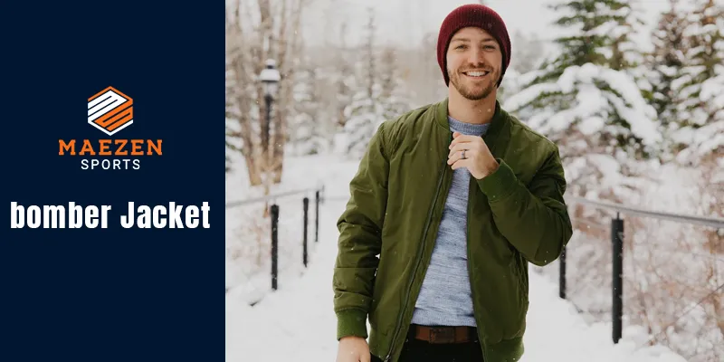 Man wearing a stylish bomber jacket by Maezens Sports in a snowy setting.